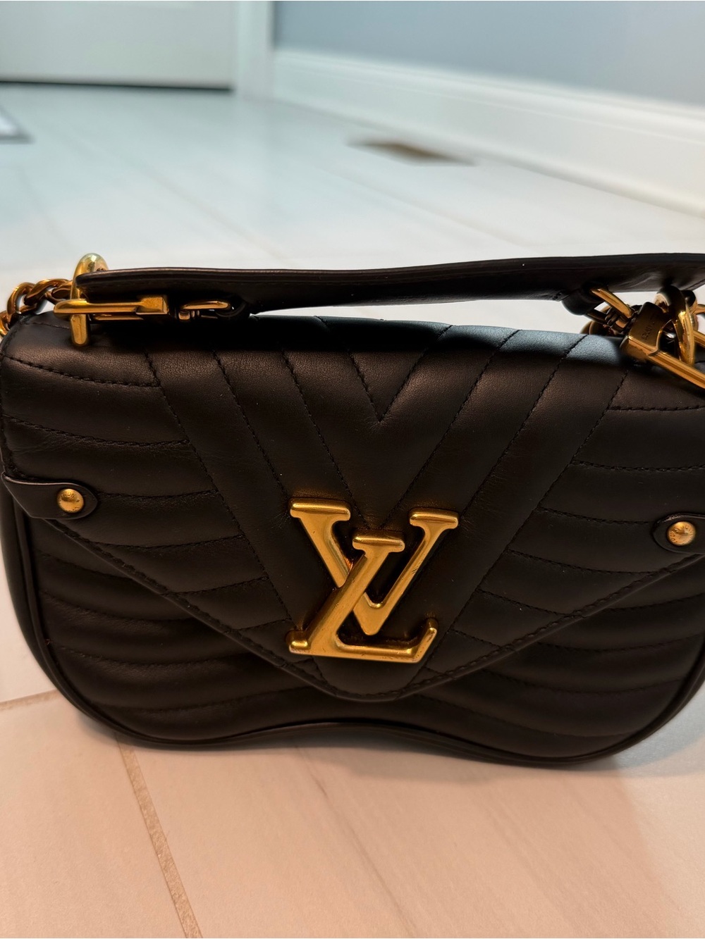 Louis Vuitton Black Quilted Shoulder Bag with Gold Hardware
